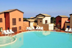 Maison de 2 chambres avec piscine partagee terrasse amenagee et wifi a Belgodere